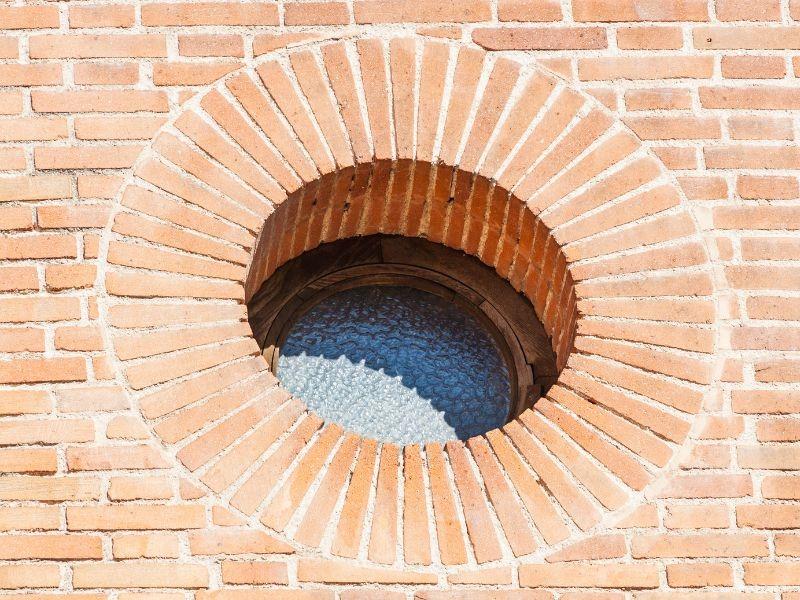 Fenêtre œil de bœuf sur-mesure Œil de bœuf façade
