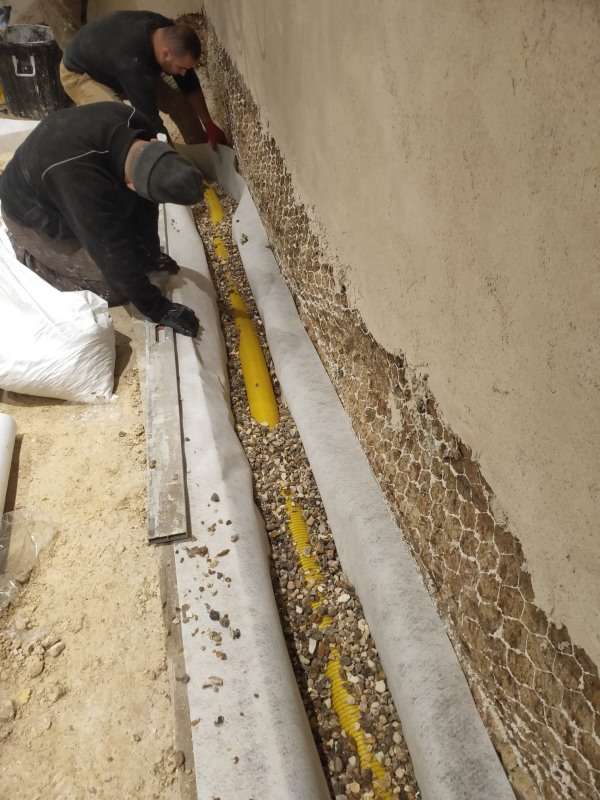 Travaux de drainage sous sol