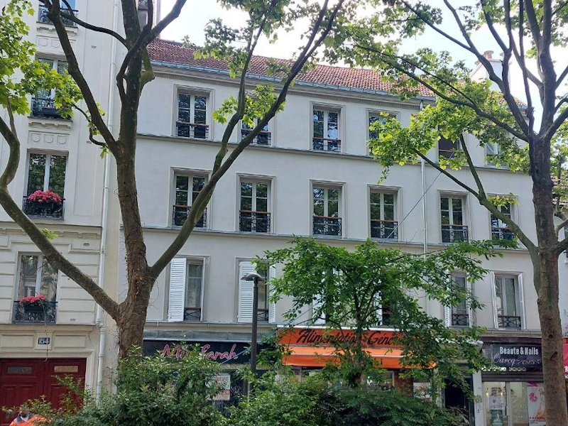 Ravalement de façade d'un immeuble à Paris 19e