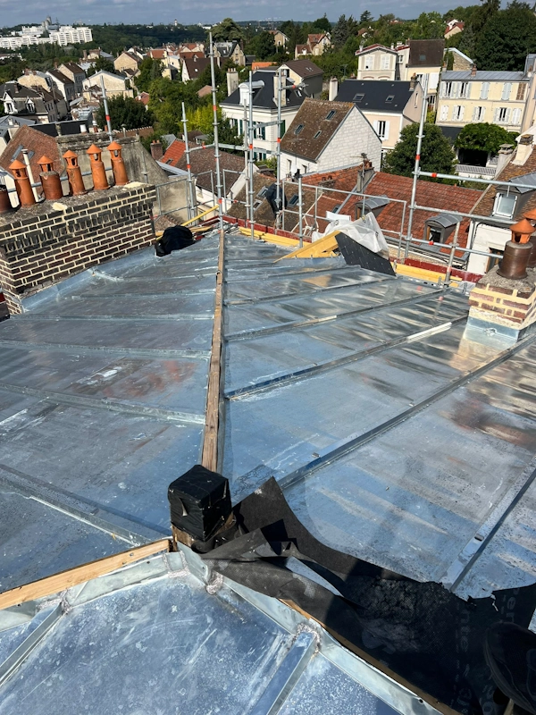 Renovation toit en zinc val doise
